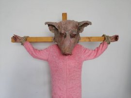 Schwein am Kreuz